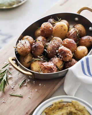 Confit aardappelen met rosemary oil: Scandinavische elegantie op je bord