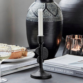 Zwarte kandelaars - Het Adres