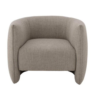 Bacio fauteuil beige 87cm van Bloomingville, geplaatst in een ruimtelijke woonomgeving