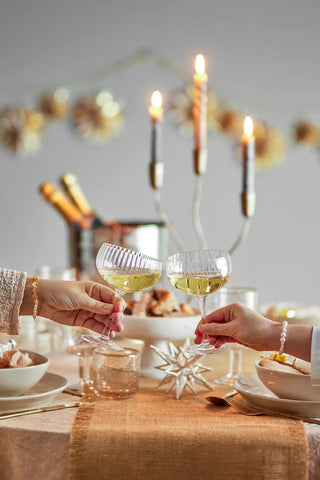 Champagneglas glas helder Astrid van Bloomingville, toegepast in een sfeervolle interieursetting