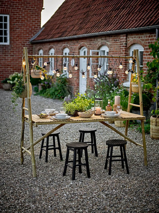 Eettafel bamboe nature Malo van Bloomingville, toegepast in een sfeervolle interieursetting