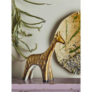Longuro ornament bruin 20cm van Bloomingville, toegepast in een sfeervolle interieursetting