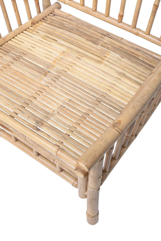 Lounge stoel bamboe nature Sole van Bloomingville, schuin van voren met vorm en afwerking zichtbaar