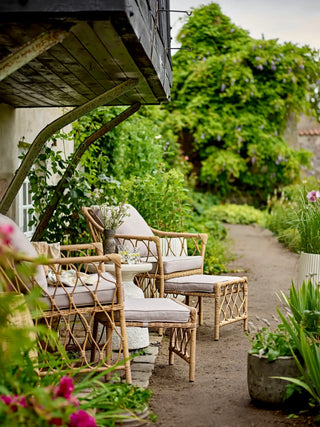Loungefauteuil polyrattan nature Belluce van Bloomingville, toegepast in een sfeervolle interieursetting