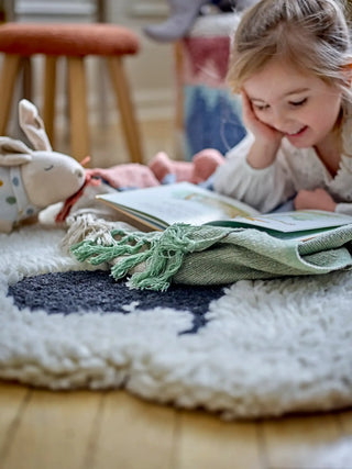 Dolly vloerkleed wol wit 84cm van Bloomingville Mini, aan de achterzijde met afwerking zichtbaar