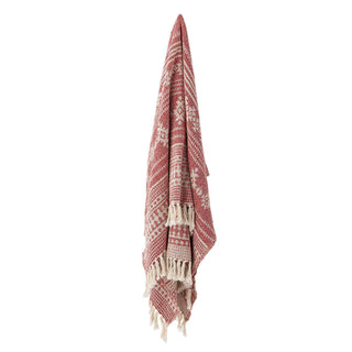 Rode Oia plaid hangend tegen een witte achtergrond