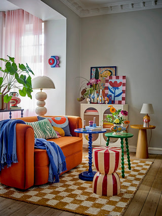 Plaid blauw gerecycled katoen Frello 130x160cm van Bloomingville, toegepast in een stijlvolle woonkamer