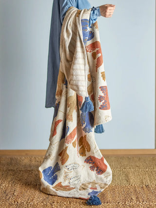 Plaid gerecycled katoen bruin Anniversary 130x160cm van Bloomingville, toegepast in een sfeervolle interieursetting