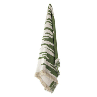 Plaid Haxby groen 160x130cm van Bloomingville, los gedrapeerd in een sfeervolle interieursetting