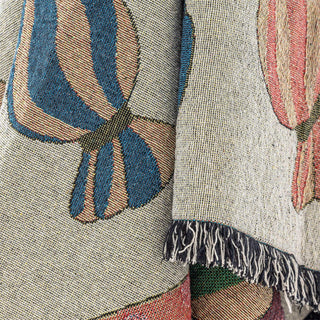 Plaid katoen naturel Caramella 130x150cm van Bloomingville, toegepast in een stijlvolle woonkamer
