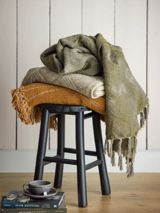 Plaid wol groen Ginger 125x150cm van Bloomingville, toegepast in een sfeervolle interieursetting