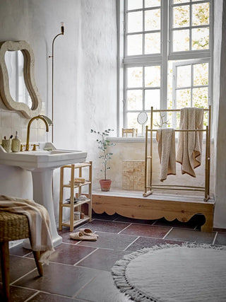 Vloerkleed wol nature Lenea 110cm van Bloomingville, toegepast in een sfeervolle interieursetting