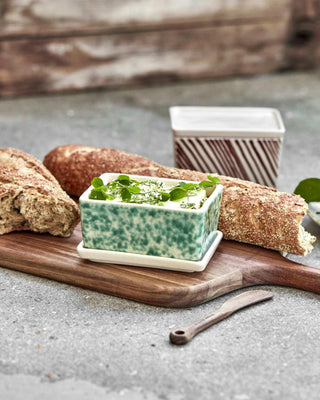 Bewaardozen set Diva groen van House Doctor, toegepast in een sfeervolle interieursetting