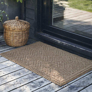 Deurmat Clean naturel 90x60cm van House Doctor, toegepast in een sfeervolle interieursetting