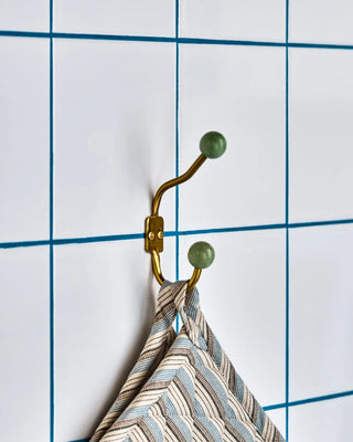 Haak Ball Aqua 13cm - 2 stuks van House Doctor, toegepast in een stijlvolle woonkamer