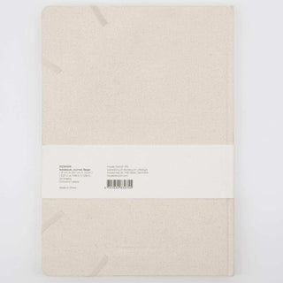 Notitieboek Journal beige A4 van House Doctor, met stof en structuur van dichtbij zichtbaar