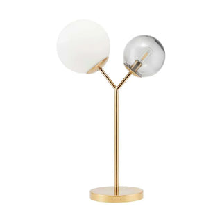 House Doctor Twice tafellamp met messingkleurig frame en twee glazen bolkappen op witte achtergrond
