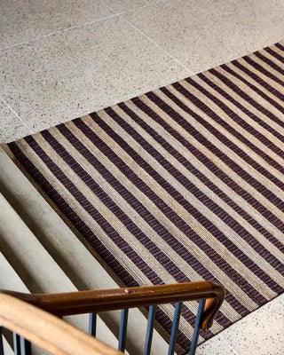 Vloerkleed Block Bruin Natuur 200x300cm van House Doctor, toegepast in een sfeervolle interieursetting