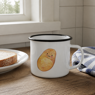 Ligarti emaille mok aardappel – 300 ml in een natuurlijke alledaagse omgeving, met de originele illustratie zichtbaar.