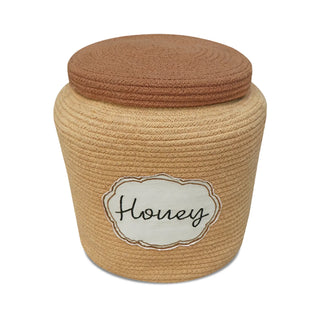 Honingkleurige Honey Pot-mand met toffeekleurig deksel en Honey-etiket.