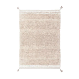 Lichtroze vloerkleed met lichte banen en hoekkwasten.
