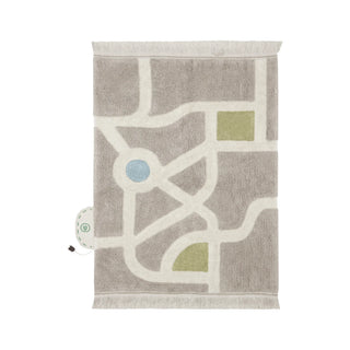 Speelvloerkleed met lichte wegen, groen en blauwe vlakken.