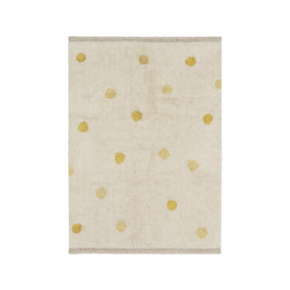 Naturel Hippy Dots-vloerkleed met honingkleurige stippen. Op witte achtergrond.