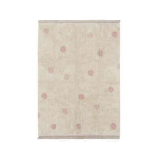 Naturel Hippy Dots-vloerkleed met roze stippen. Op witte achtergrond.