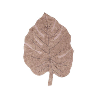 Monstera-vloerkleed in vintageroze, in bladvorm met nerven en steel. Op witte achtergrond.