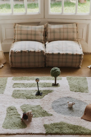 Hyde Park-speelkleed met groene vakken en accessoires voor een bank.