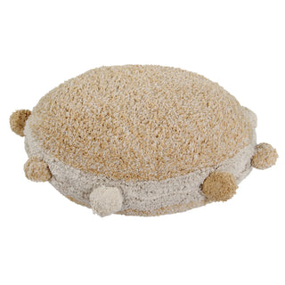 Rond honingkleurig vloerkussen met pompons.