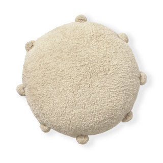 Naturel rond Bubbly-vloerkussen met bolletjesrand op witte achtergrond.