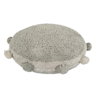 Rond olijfkleurig vloerkussen met pompons.