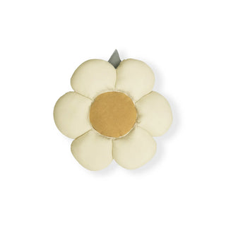 Bloemkussen met lichte bloemblaadjes en honingkleurig hart.
