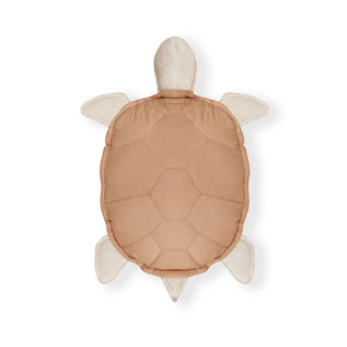 Schildpadkussen met terracotta schild en lichte poten.