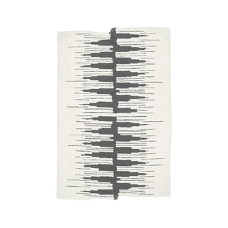 Naturel Zagros-vloerkleed met donkergrijs vertakt middenmotief. Op een witte achtergrond.