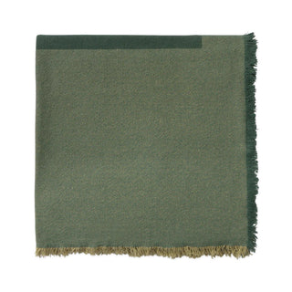 Opgevouwen Vertical-tafelkleed in groen met franjes.
