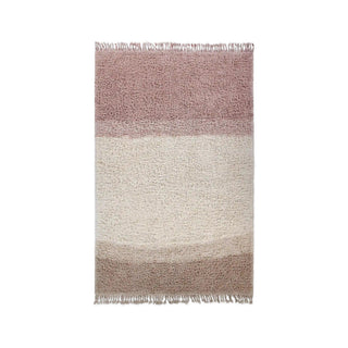Vloerkleed met roze, lichte en bruine banen en franjes.