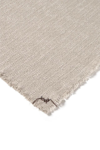 Detail van de structuur en randafwerking van de naturel Legacy-placemat.