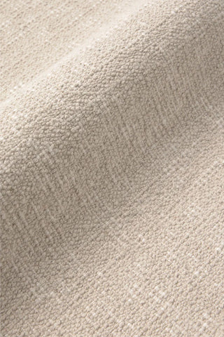 Detail van de structuur en randafwerking van de naturel Legacy-placemat.