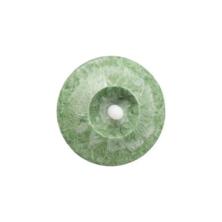 Groene smalle Marble ledkaars van bovenaf met vlamdetail van Mansion atmosphere
