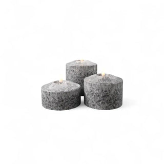 Zwarte brede Marble ledkaarsen in drie formaten op een witte achtergrond van Mansion atmosphere