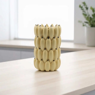 Pot Banana Pop geel 15cm van Mansion atmosphere, toegepast in een sfeervolle interieursetting