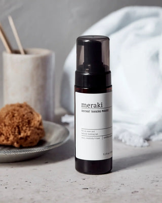Instant bruiningsmousse 150ml van Meraki, toegepast in een sfeervolle interieursetting