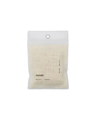 Katoenen washandje lemongrass 140g van Meraki, met etiket en verpakking duidelijk zichtbaar