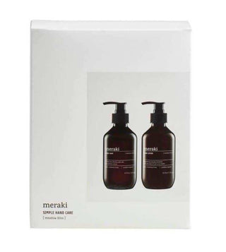 Voorzijde van Meraki Meadow Bliss cadeaubox met afbeelding van twee pompflessen