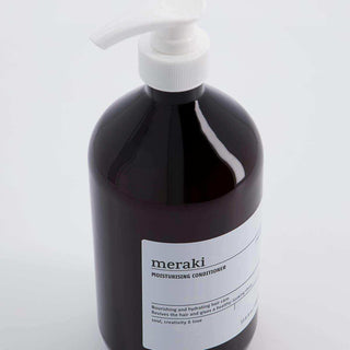Meraki Moisturising Conditioner-pompflacon schuin van boven met pomp en etiket in beeld