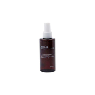 Meraki zeezout haarspray in donkere flacon met witte spraydop op witte achtergrond