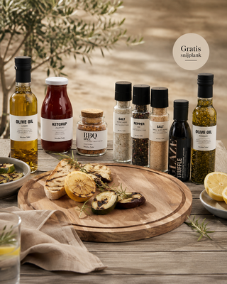 BBQ & borrel pakket + gratis snijplank twv 69,95 van Nicolas Vahe, gepresenteerd in een culinaire tafelsetting