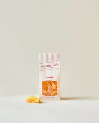 Citrus snoepjes 150g van Nicolas Vahe, in een culinaire setting met bijpassende ingrediënten